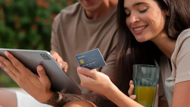 A couple enjoying Credit Card Rewards Programs.