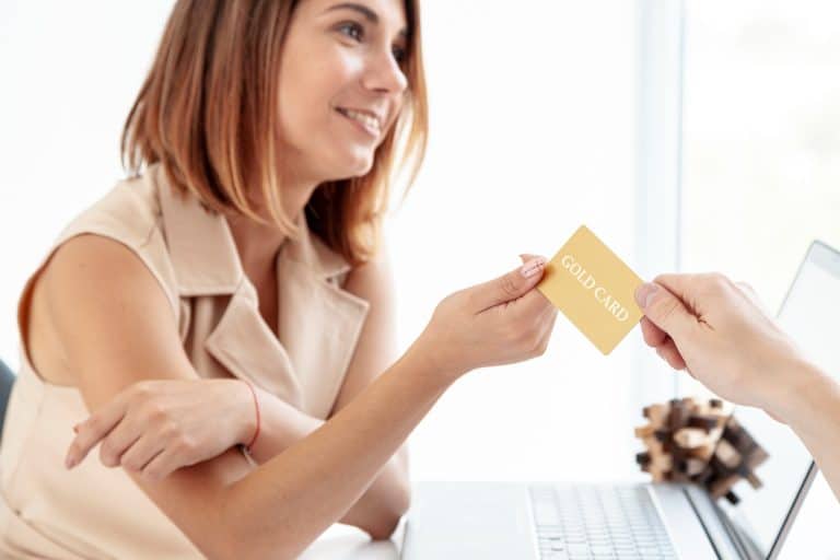 Woman learning about How to Apply for a Credit Card.
