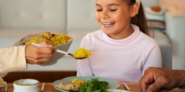 A little girl enjoying US Food Stamps Program.